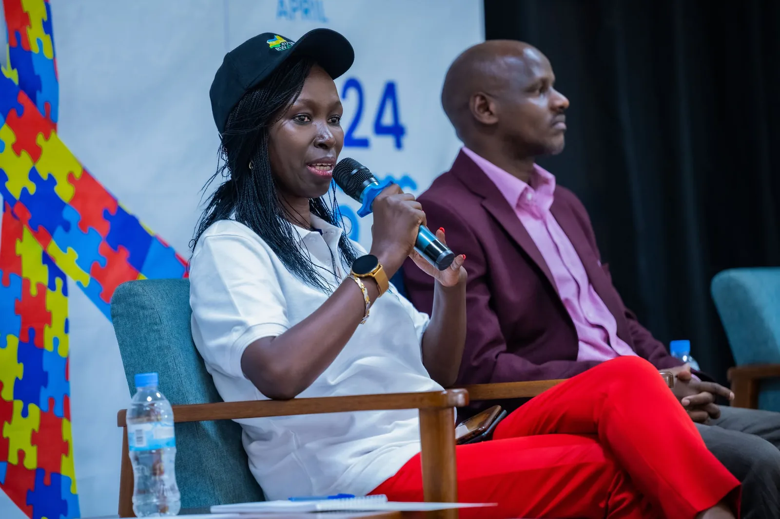 Rosine intervenant lors d’une table ronde en 2024